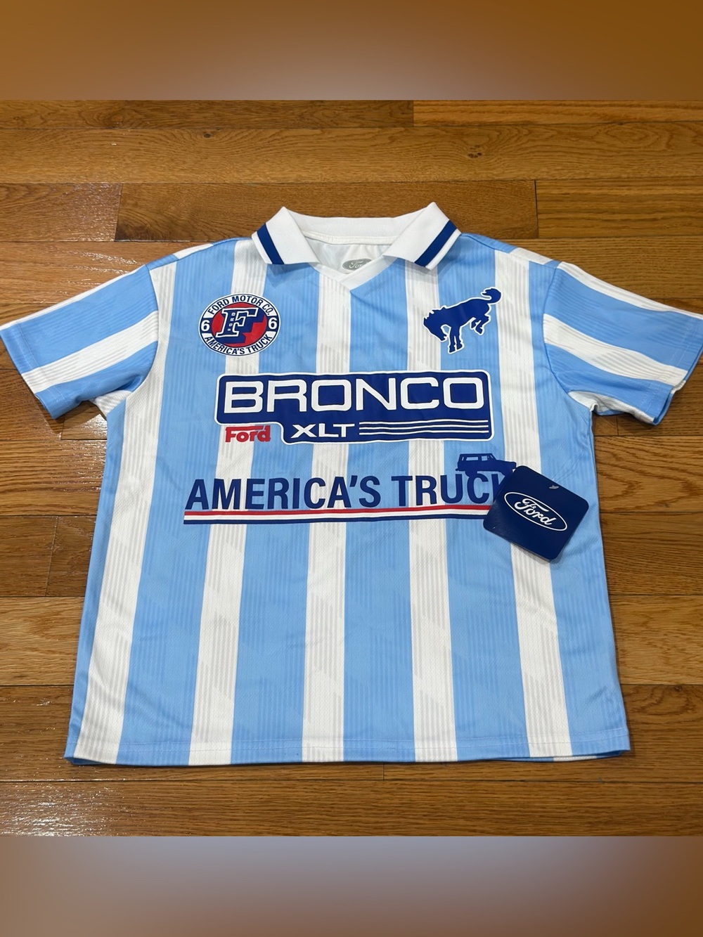 Ford Kids Bronco size L 10-12 Striped Polo Tee in Light Blue & White
